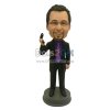 Executive busy on phone bobblehead